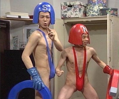 Asian guys in odd suits.