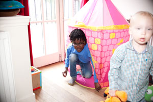 Kids playing in a play house